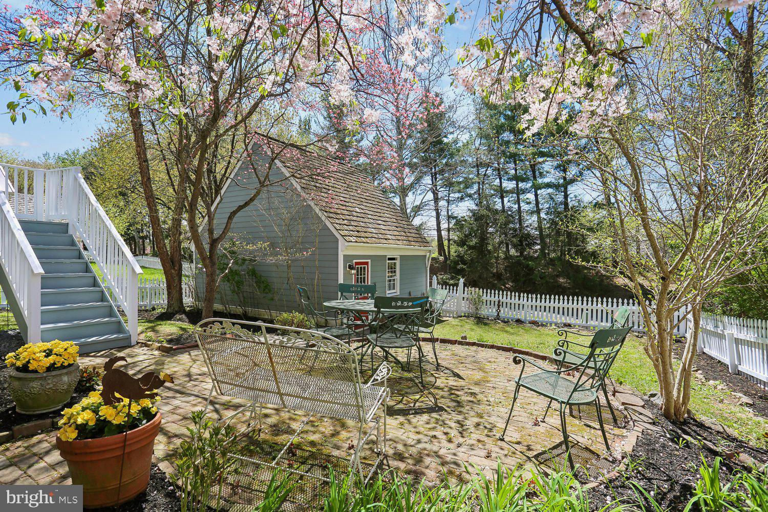 306 Beckwith Street Gaithersburg, MD 20878 - Photo 58 of 62 Brick patio bordered by perennial gardens