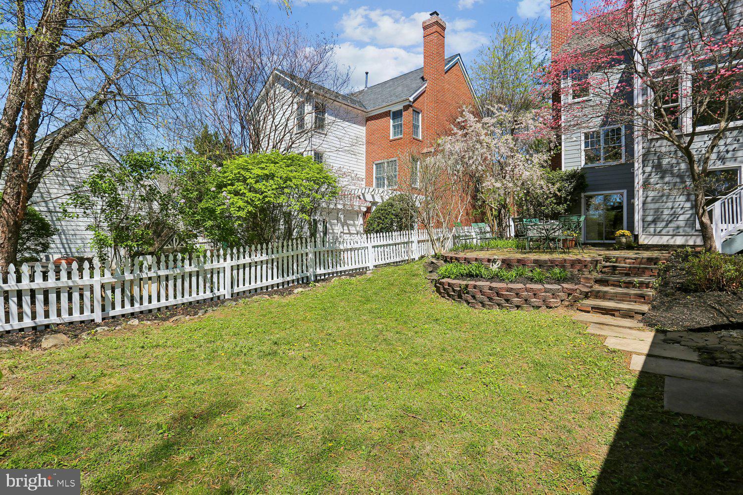 306 Beckwith Street Gaithersburg, MD 20878 - Photo 60 of 62 Brick patio & grassy lawn