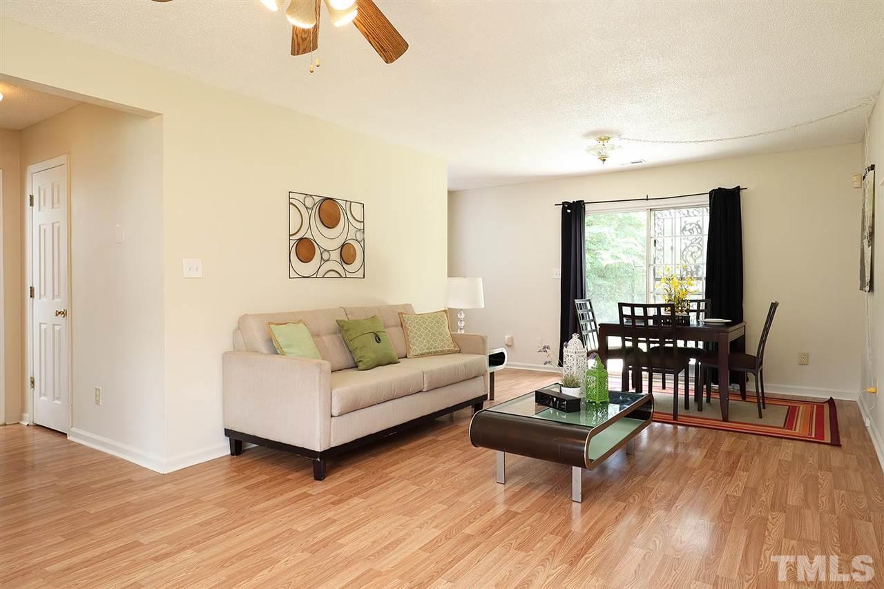 4103 Sudbury Road Durham, NC 27704 - Photo 4 of 24 Living room/dining room tandem with open feel!