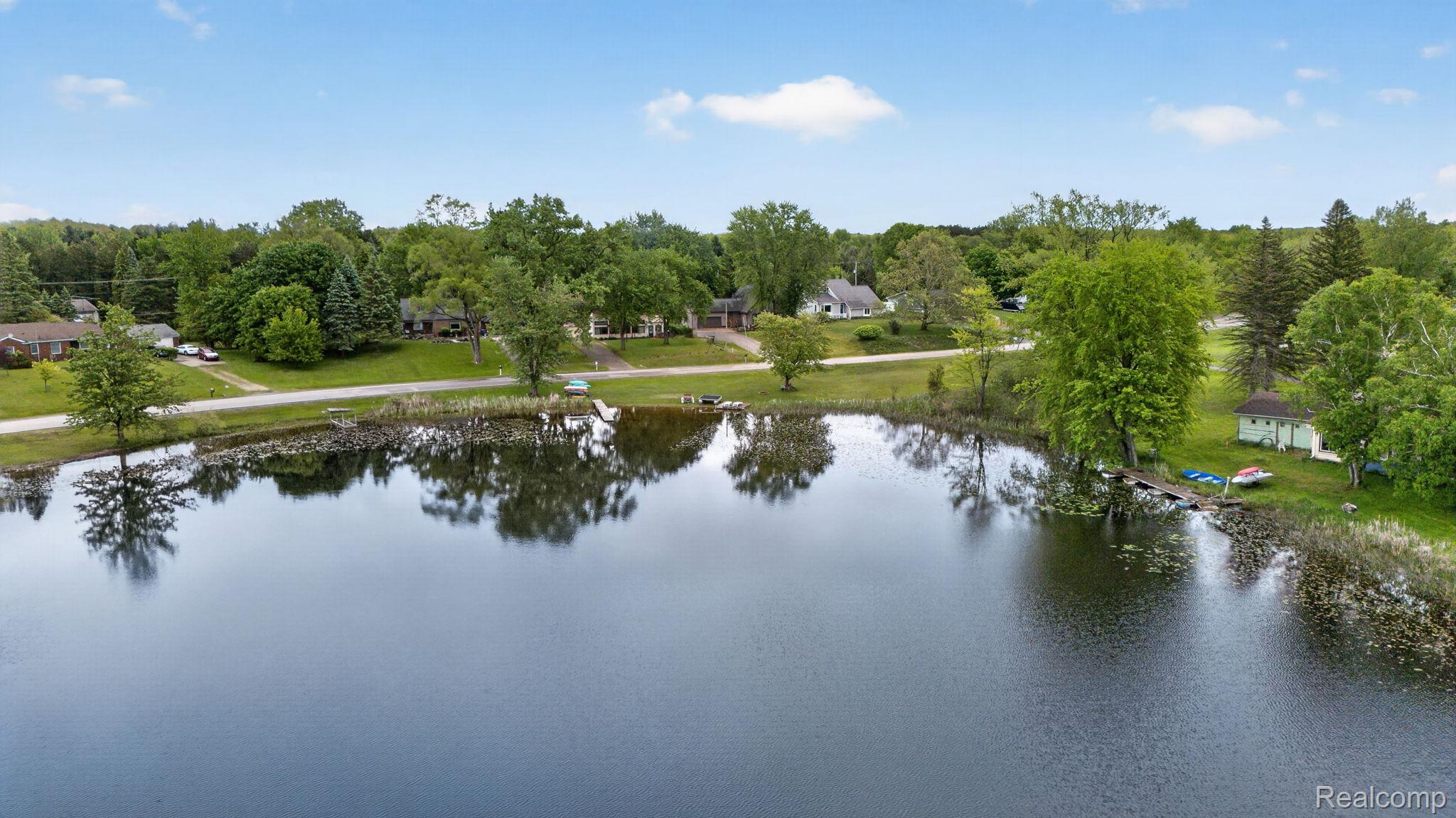 1280 Petts Road Fenton, MI 48430 - Photo 54 of 62 Water view featuring a tree filled landscape