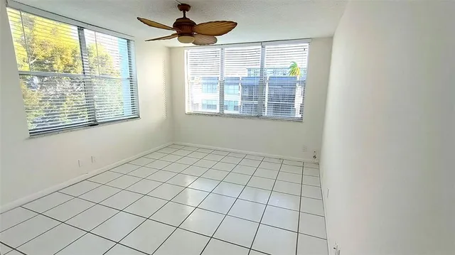 a view of an empty room and window