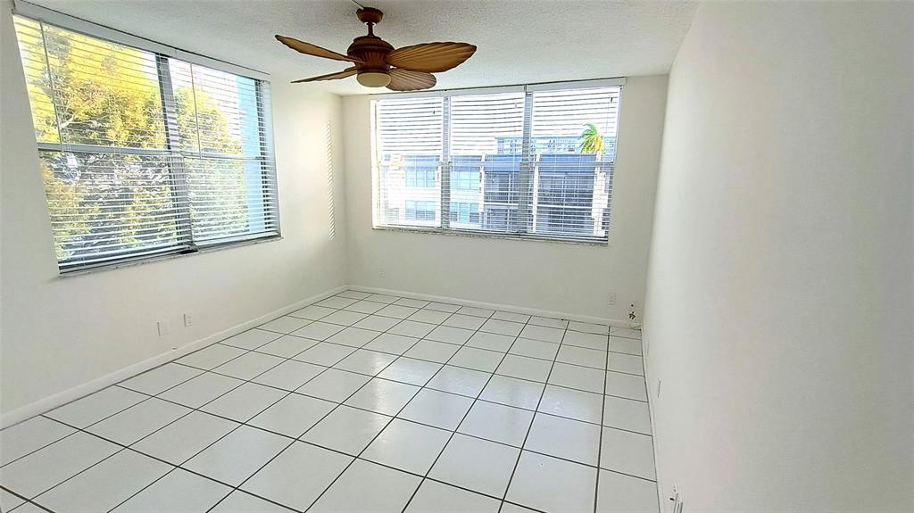 777 South Federal Highway, Unit M301 Pompano Beach, FL 33062 - Photo 5 of 16 a view of an empty room and window