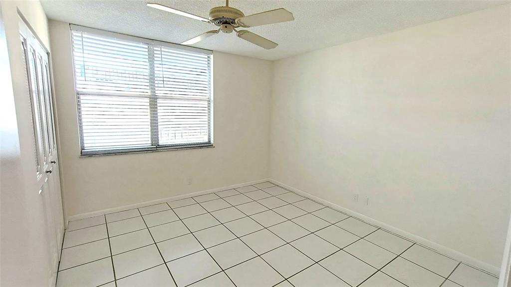 777 South Federal Highway, Unit M301 Pompano Beach, FL 33062 - Photo 8 of 16 a view of an empty room and window
