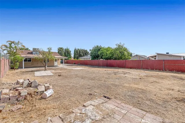 a view of backyard with outdoor space