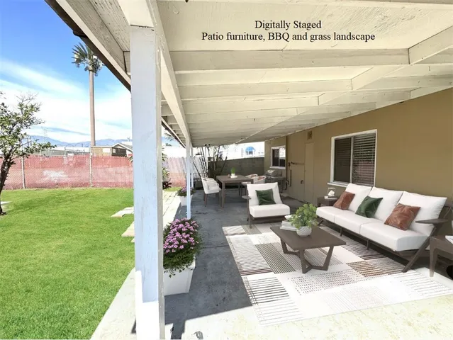 a view of yard from outdoor seating