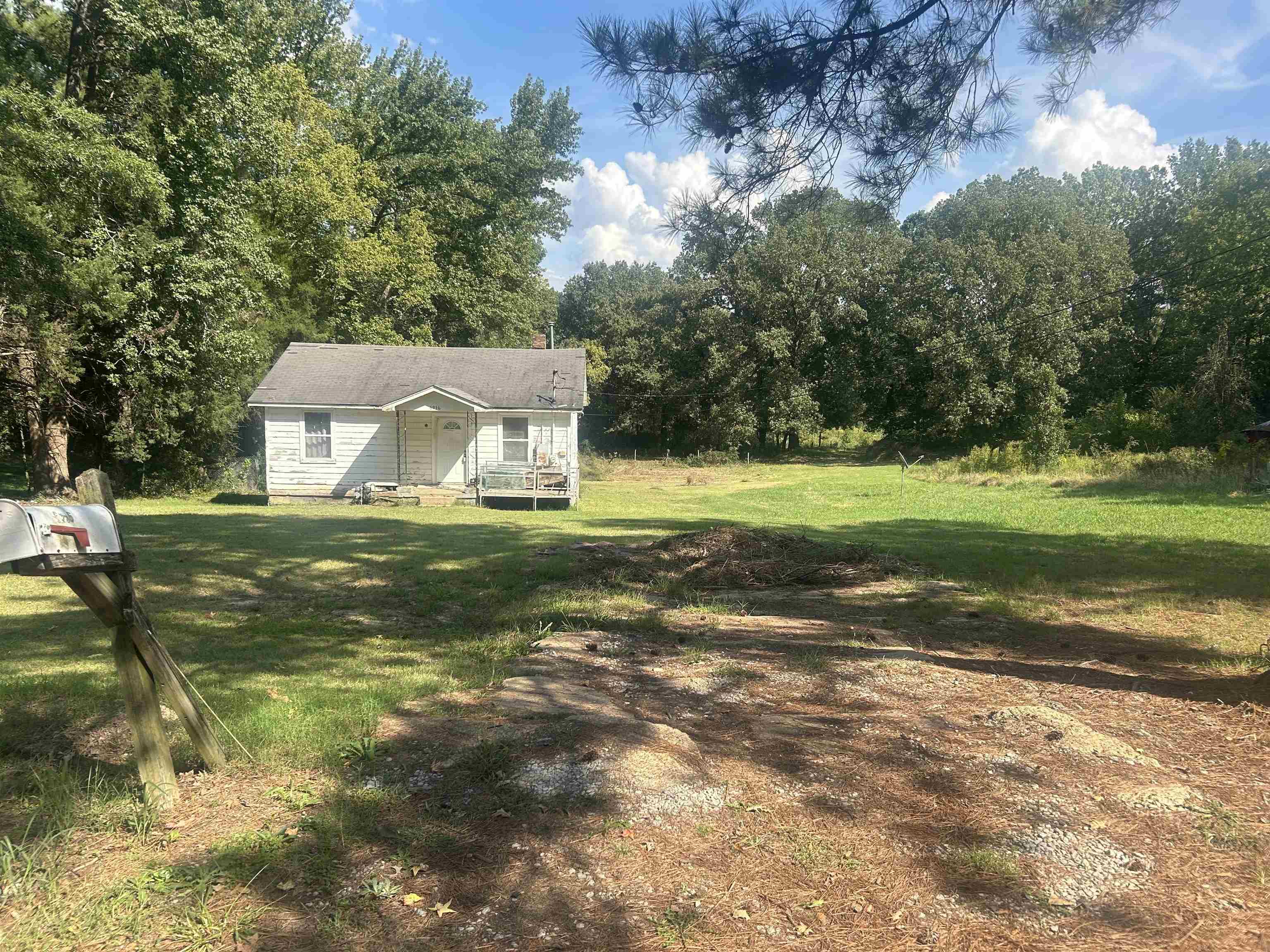 6936 Walsh Road Millington, TN 38053 - Photo 1 of 15 View of yard with a wooden deck