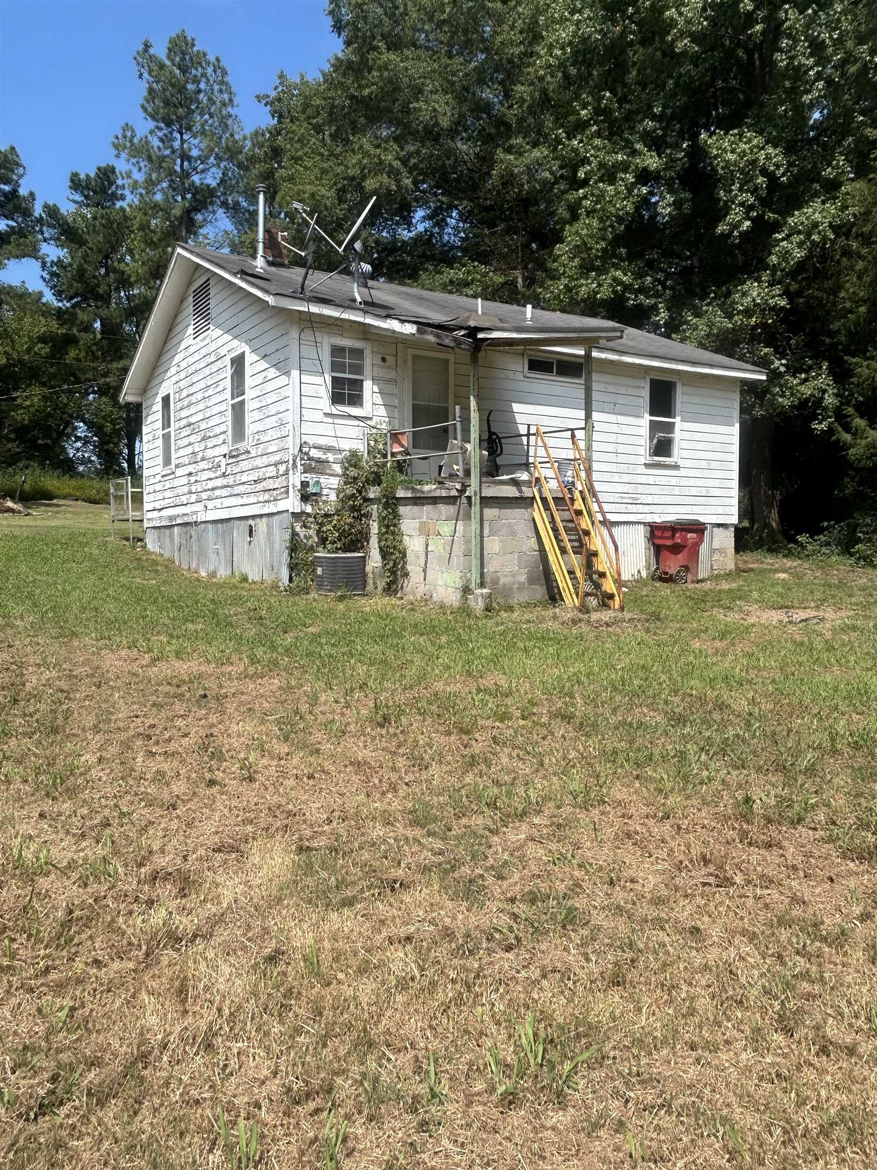 6936 Walsh Road Millington, TN 38053 - Photo 7 of 15 Rear view of property with a lawn and central AC