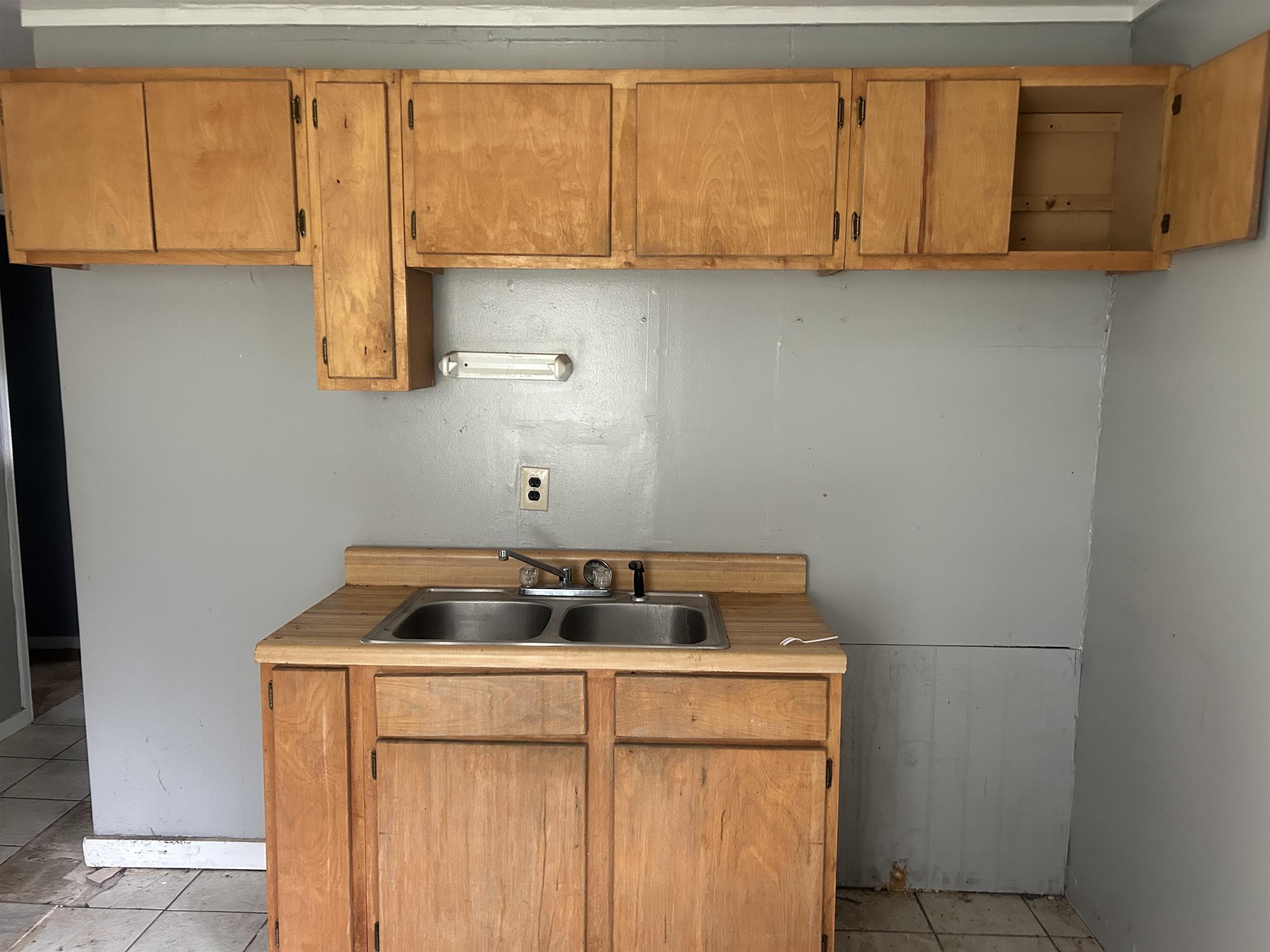 6936 Walsh Road Millington, TN 38053 - Photo 9 of 15 Kitchen with sink and light tile patterned floors
