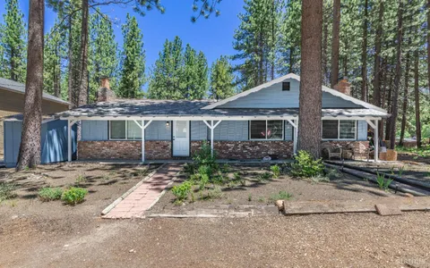 front view of a house with a small yard