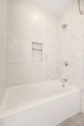 a bathroom with a bathtub