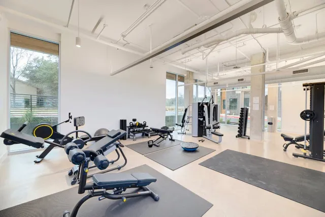 a view of a room with gym equipment