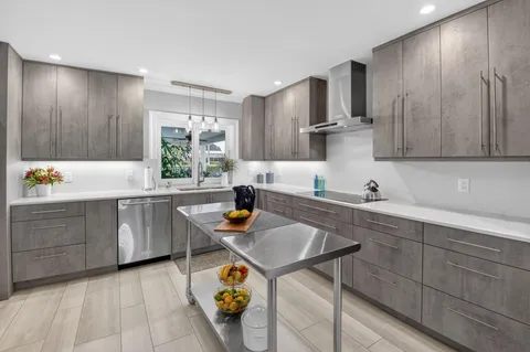 a living room with fireplace furniture and a flat screen tv