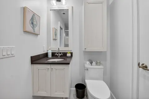 an aerial view of a house with a swimming pool yard and outdoor seating