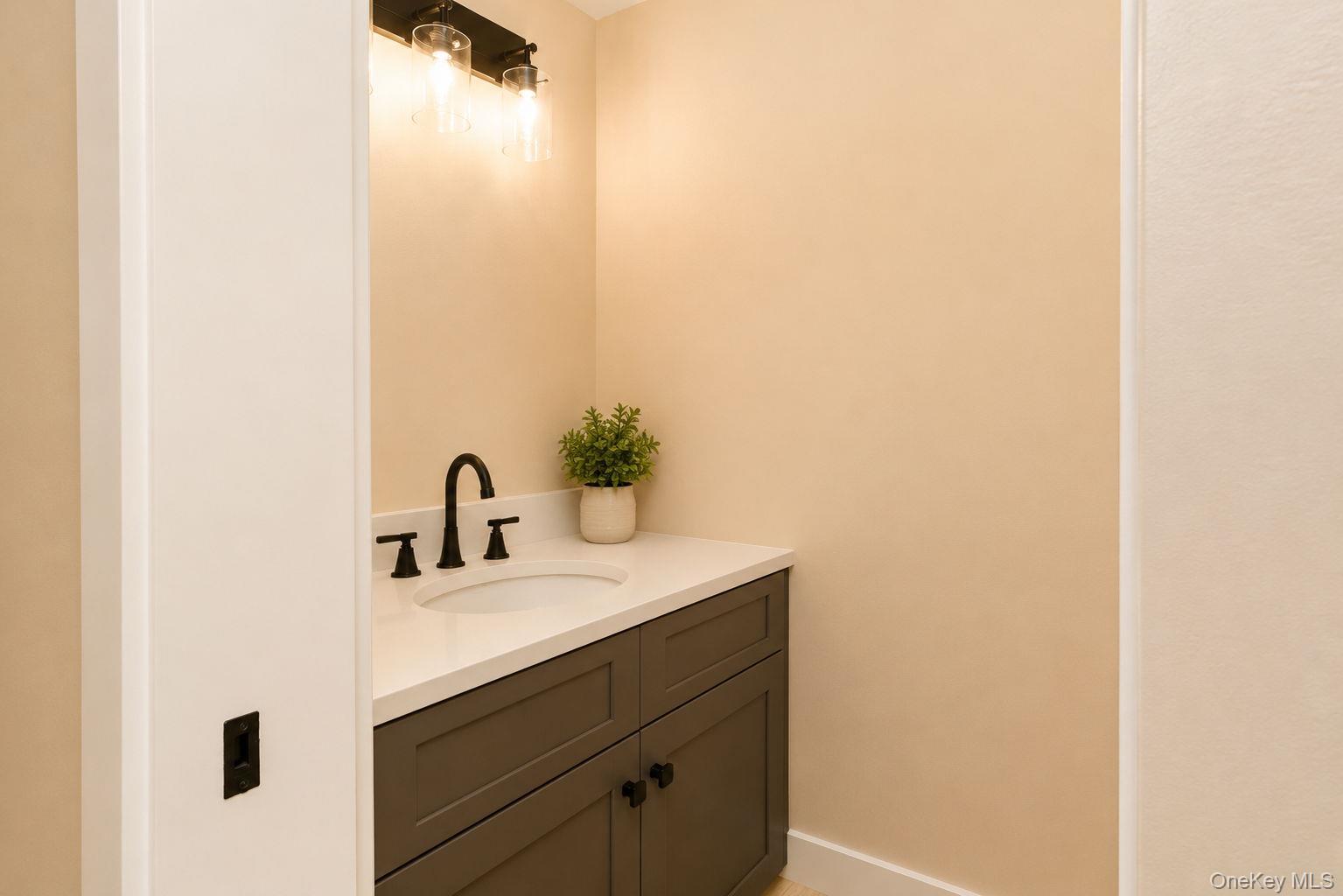 33 County Rte 17 Pine Bush, NY 12566 - Photo 21 of 47 Vanity with a white countertop and an undermount sink 1/2 bath vanity door