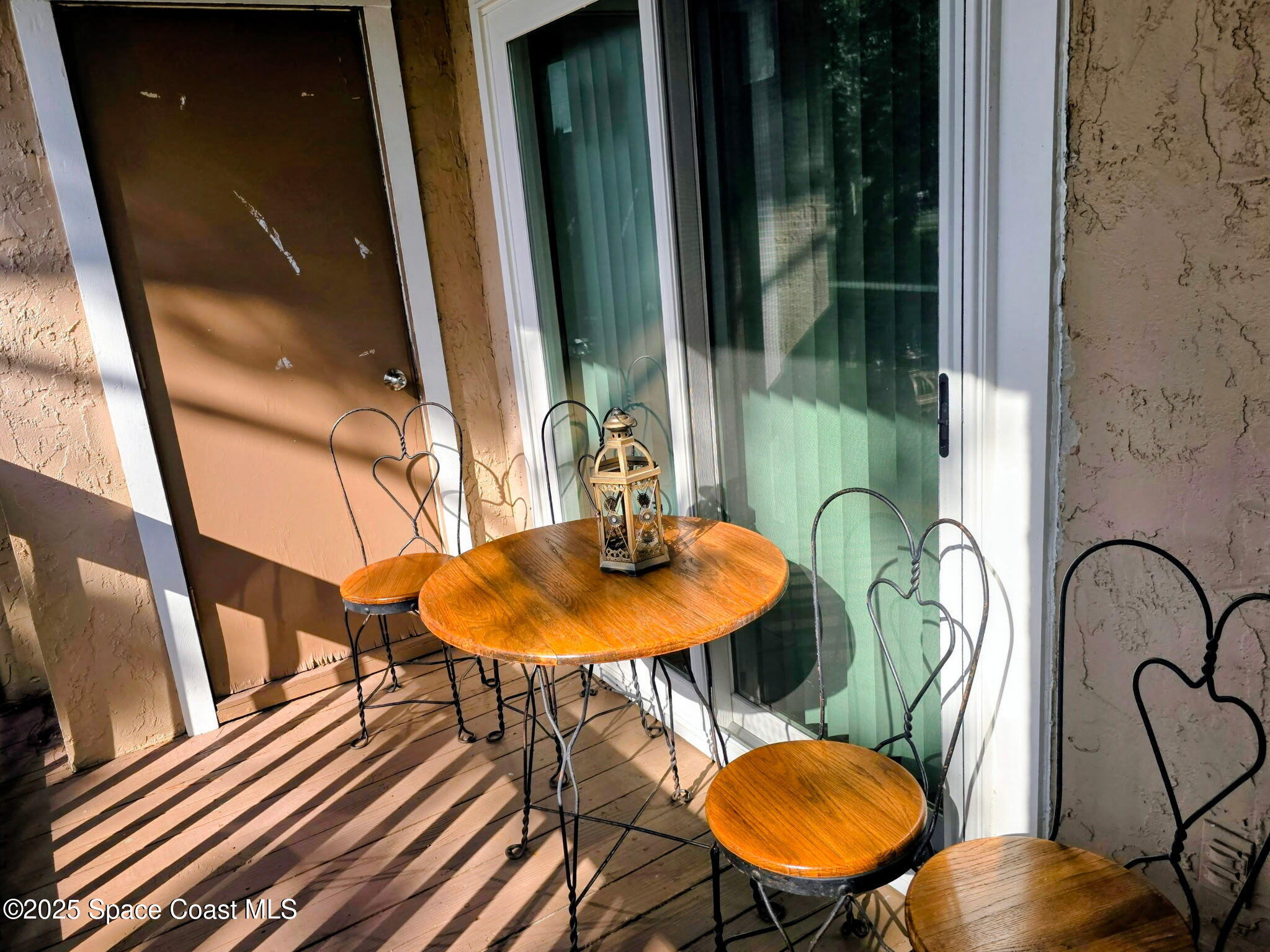 7667 North Wickham Road, Unit 416 Melbourne, FL 32940 - Photo 7 of 30 a view of a swimming pool from a furniture