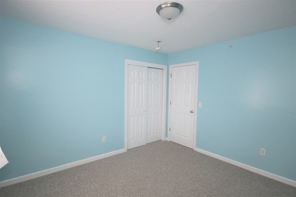 25 George Street, Unit 5 Dudley, MA 01571 - Photo 16 of 42 a view of an empty room