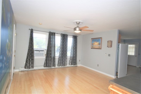 25 George Street, Unit 5 Dudley, MA 01571 - Photo 18 of 42 a view of a livingroom with a staircase