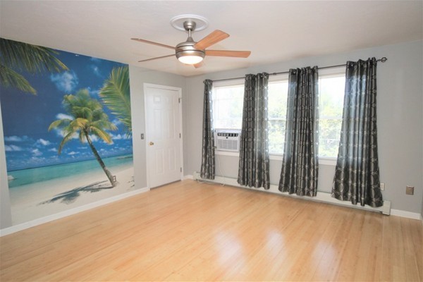 25 George Street, Unit 5 Dudley, MA 01571 - Photo 20 of 42 a view of a room with a large window