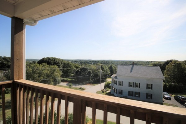 25 George Street, Unit 5 Dudley, MA 01571 - Photo 31 of 42 a view of a balcony with city view