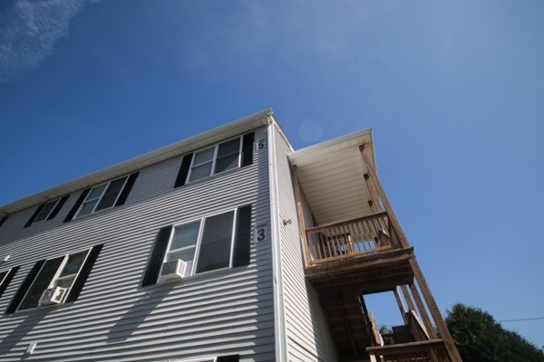 25 George Street, Unit 5 Dudley, MA 01571 - Photo 32 of 42 a view of a building with entryway