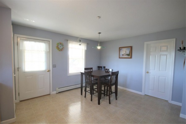25 George Street, Unit 5 Dudley, MA 01571 - Photo 8 of 42 a view of a dining room with furniture