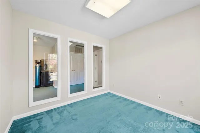 an empty room with sliding door