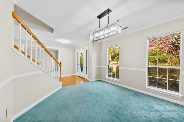 a view of an entryway with a front door