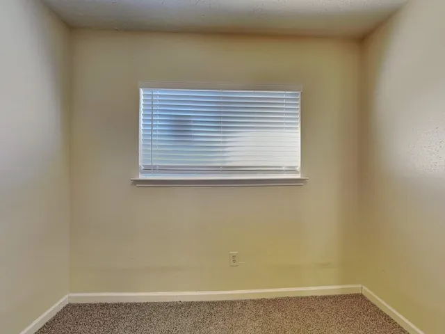 a view of a small space with a window