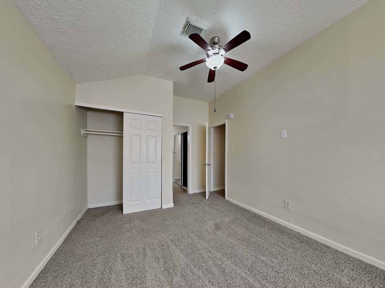9203 Rippling Fields Drive Houston, TX 77064 - Photo 8 of 16 a view of a big room with a chandelier fan