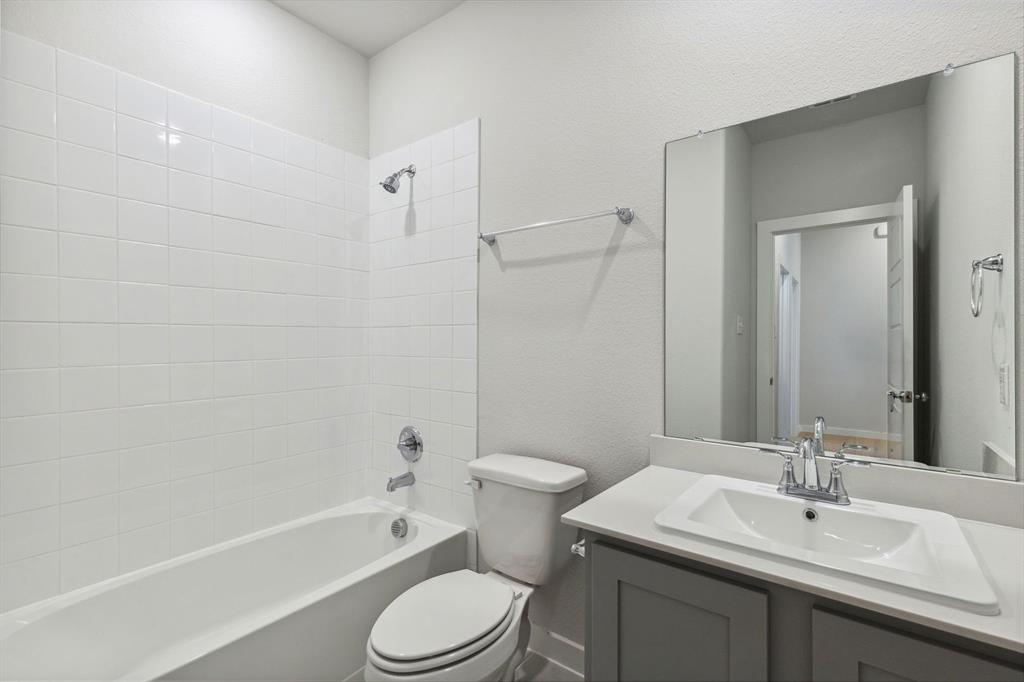 872 Sunflower Road Lavon, TX 75166 - Photo 18 of 22 Bathroom in the Ash home plan by Trophy Signature Homes – REPRESENTATIVE PHOTO