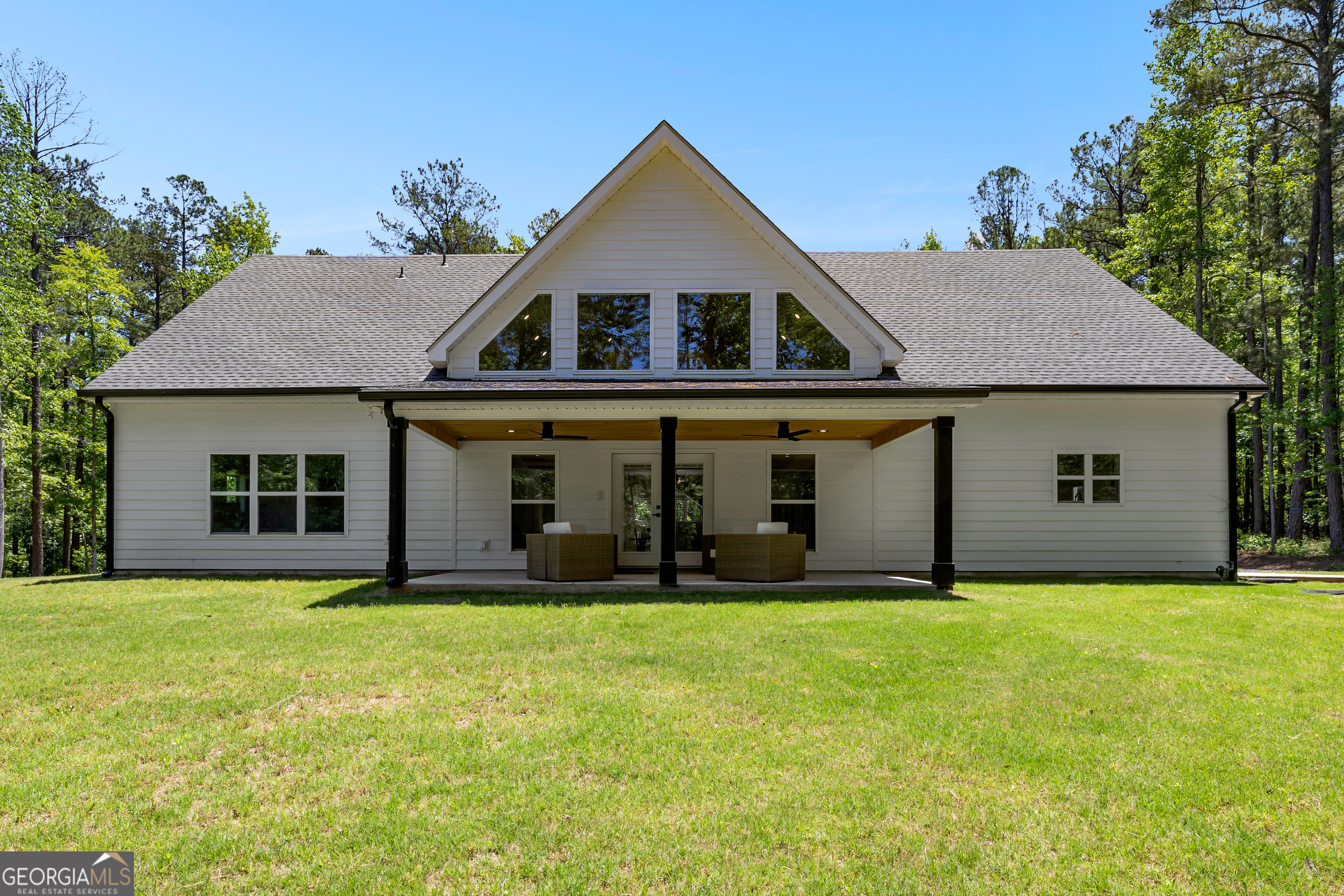 354 Turner Road Newnan, GA 30263 - Photo 72 of 79 a front view of house with yard and trees in the background