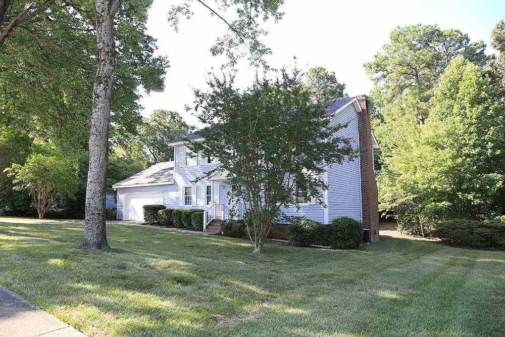 7905 Hardwick Drive Raleigh, NC 27615 - Photo 1 of 26 Live on the prettiest street in North Ridge! .39 acre level lot, sidewalk is an extra bonus! Welcome Home