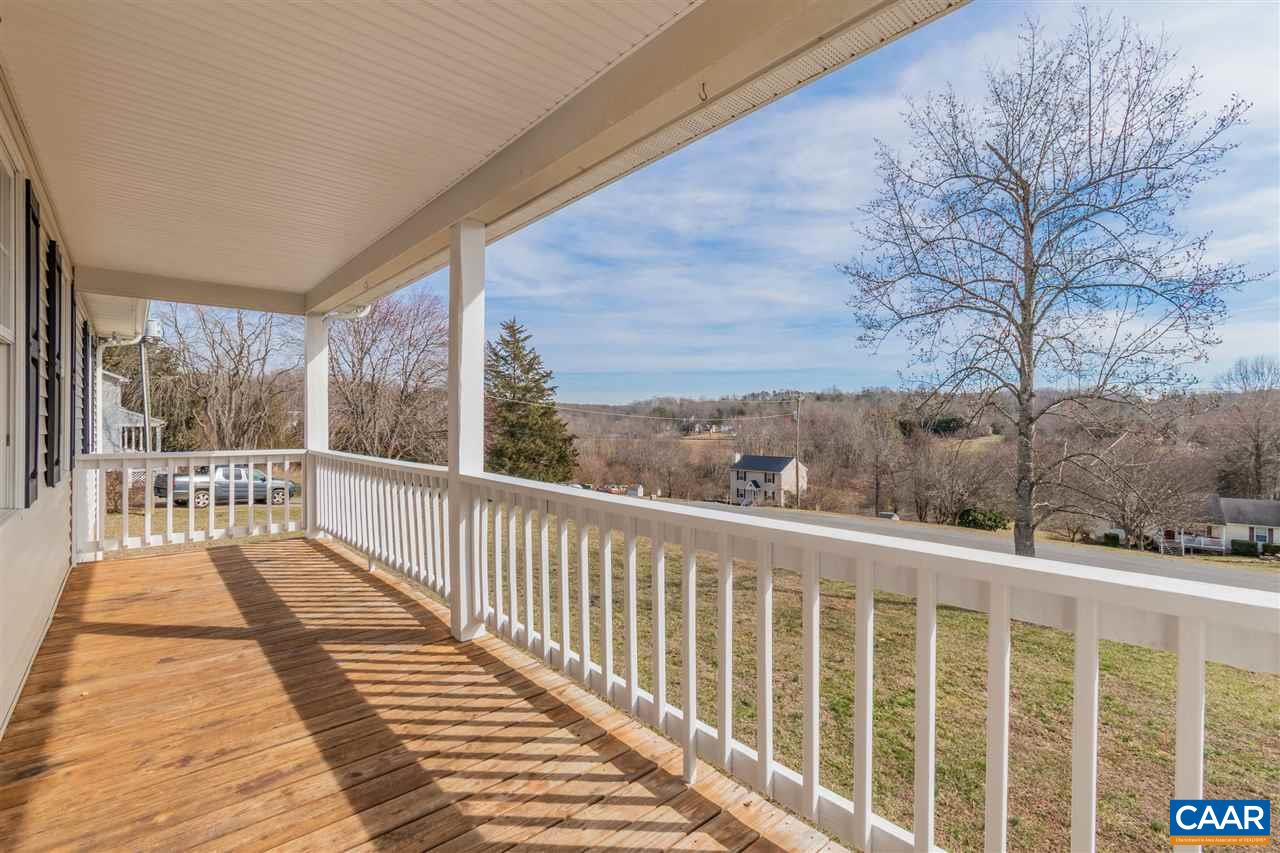 761 West Daffodil Road Ruckersville, VA 22968 - Photo 3 of 39 a view of a balcony with wooden floor