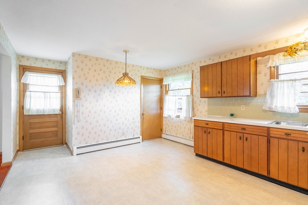 58 Wedgewood Road Worcester, MA 01602 - Photo 11 of 28 a view of a kitchen with a sink and cabinets