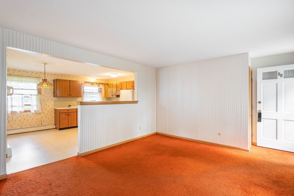 58 Wedgewood Road Worcester, MA 01602 - Photo 13 of 28 a view of a kitchen with an empty room