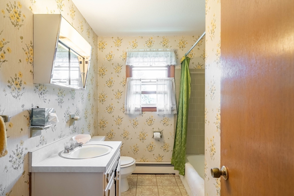 58 Wedgewood Road Worcester, MA 01602 - Photo 16 of 28 a bathroom with a sink a toilet and shower