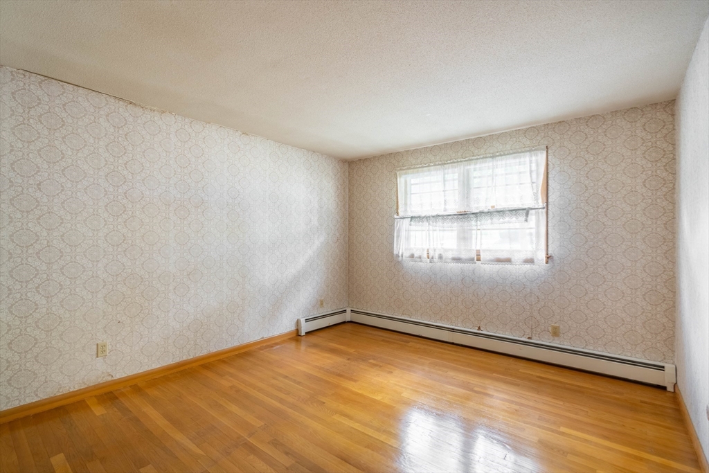 58 Wedgewood Road Worcester, MA 01602 - Photo 18 of 28 an empty room with a window