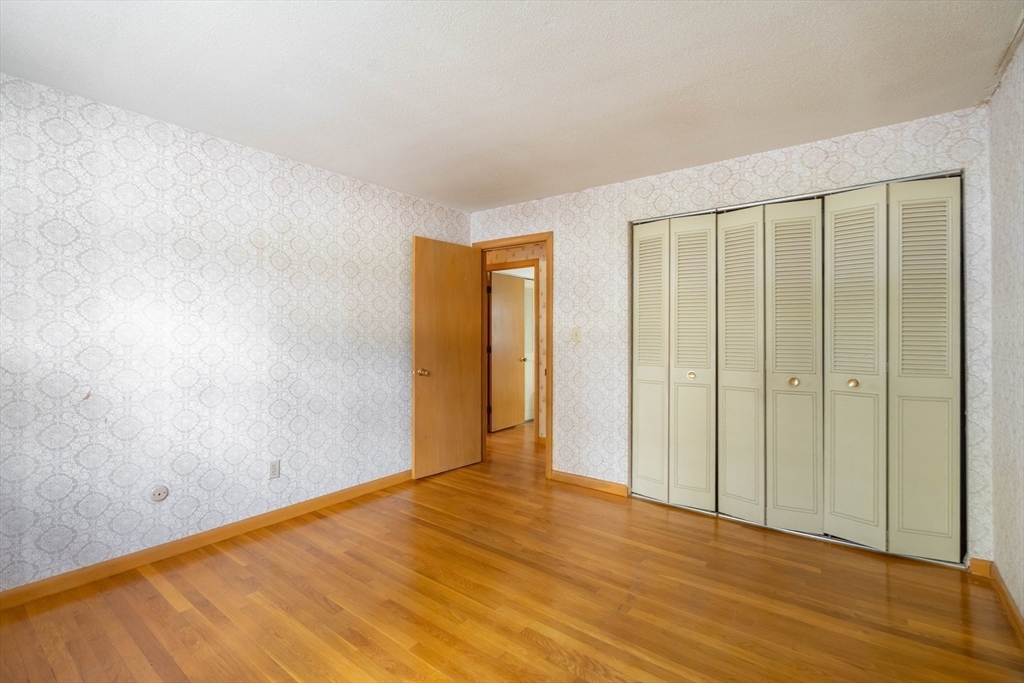 58 Wedgewood Road Worcester, MA 01602 - Photo 19 of 28 a view of an empty room with wooden floor