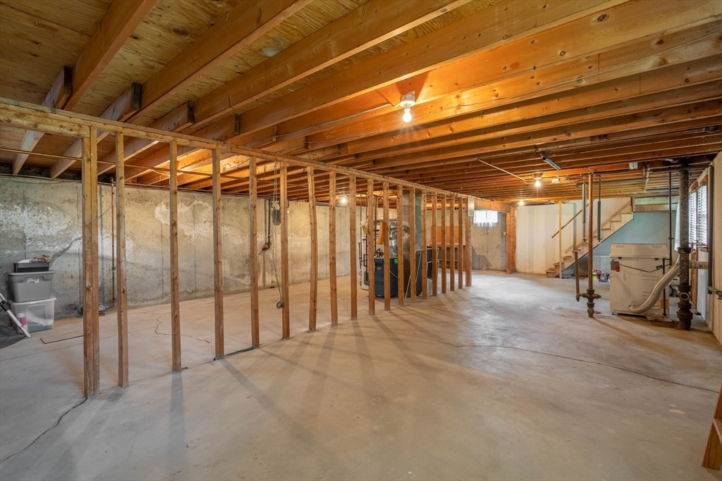 58 Wedgewood Road Worcester, MA 01602 - Photo 27 of 28 a view of an empty room with wooden walls