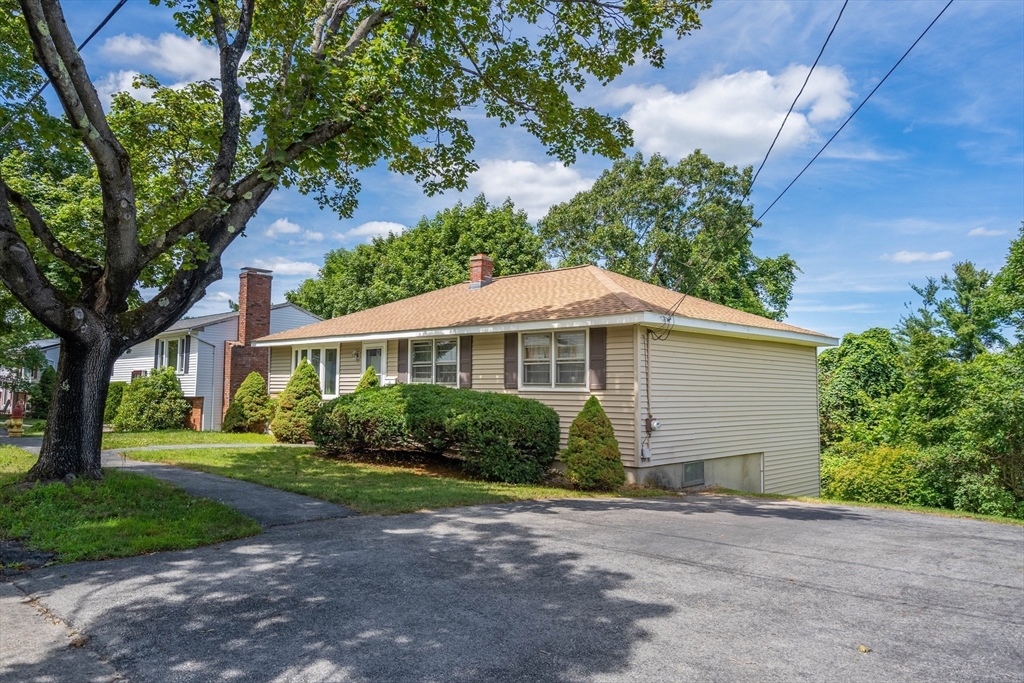58 Wedgewood Road Worcester, MA 01602 - Photo 3 of 28 a view of a house with yard and plants