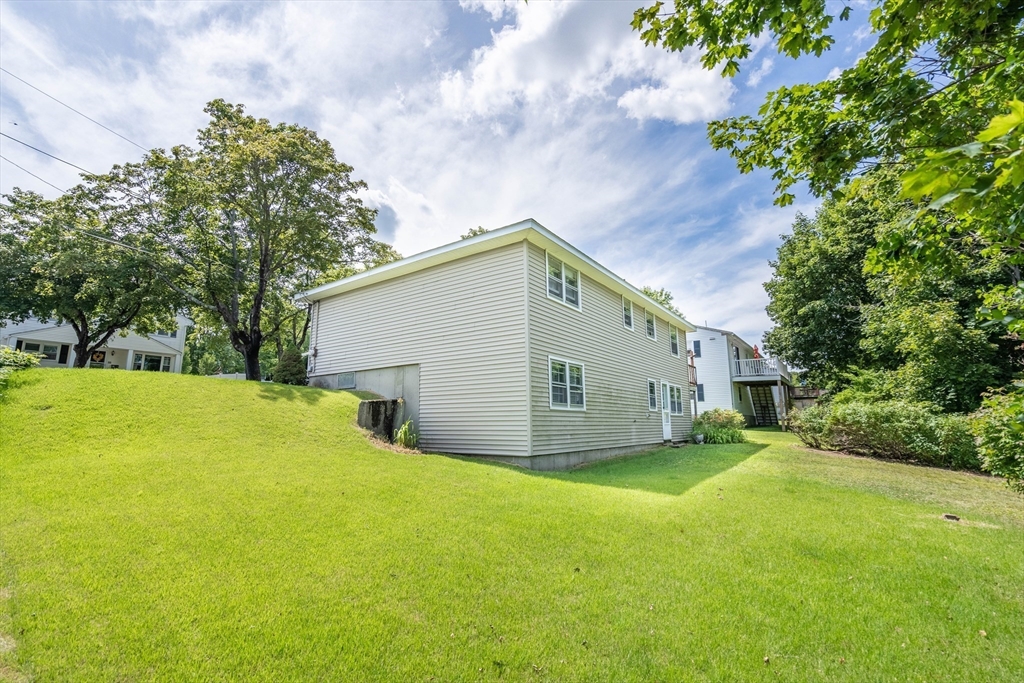 58 Wedgewood Road Worcester, MA 01602 - Photo 4 of 28 a view of a backyard of the house