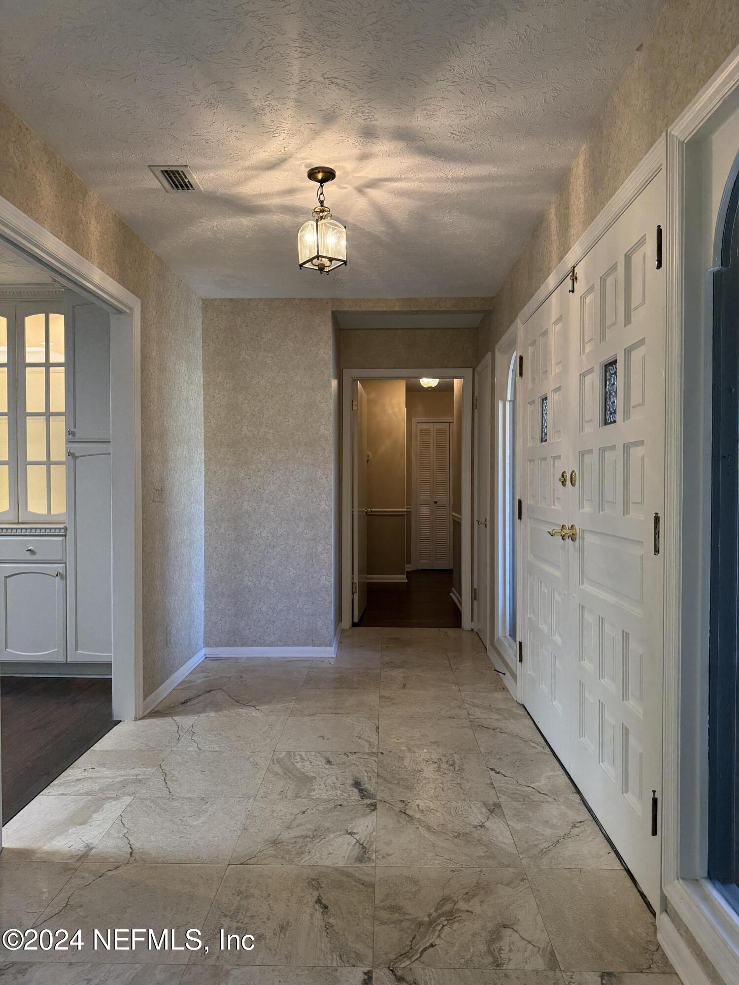 3401 Debussy Road Jacksonville, FL 32277 - Photo 17 of 96 Foyer to Hall