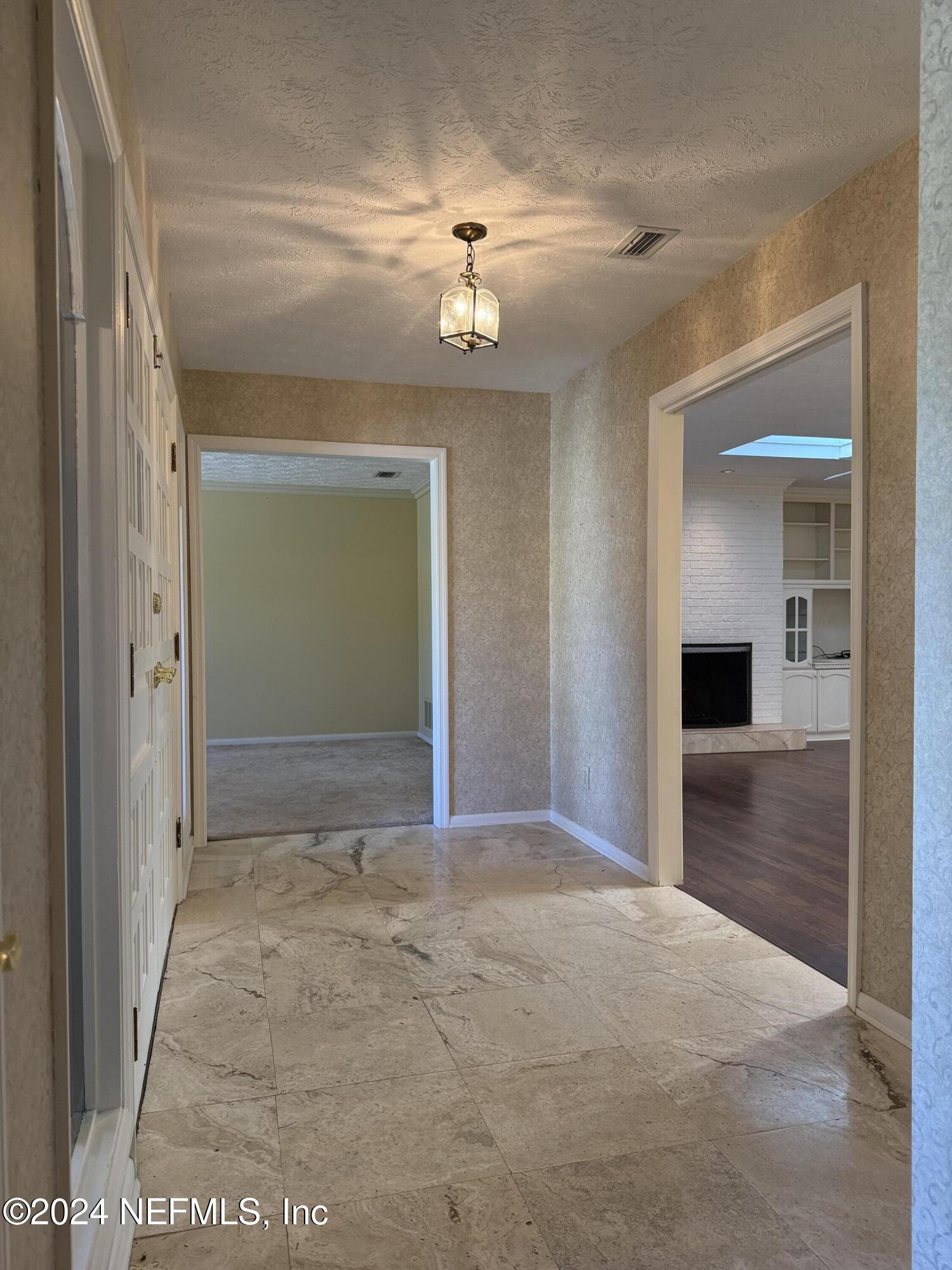 3401 Debussy Road Jacksonville, FL 32277 - Photo 18 of 96 Foyer to great room and living