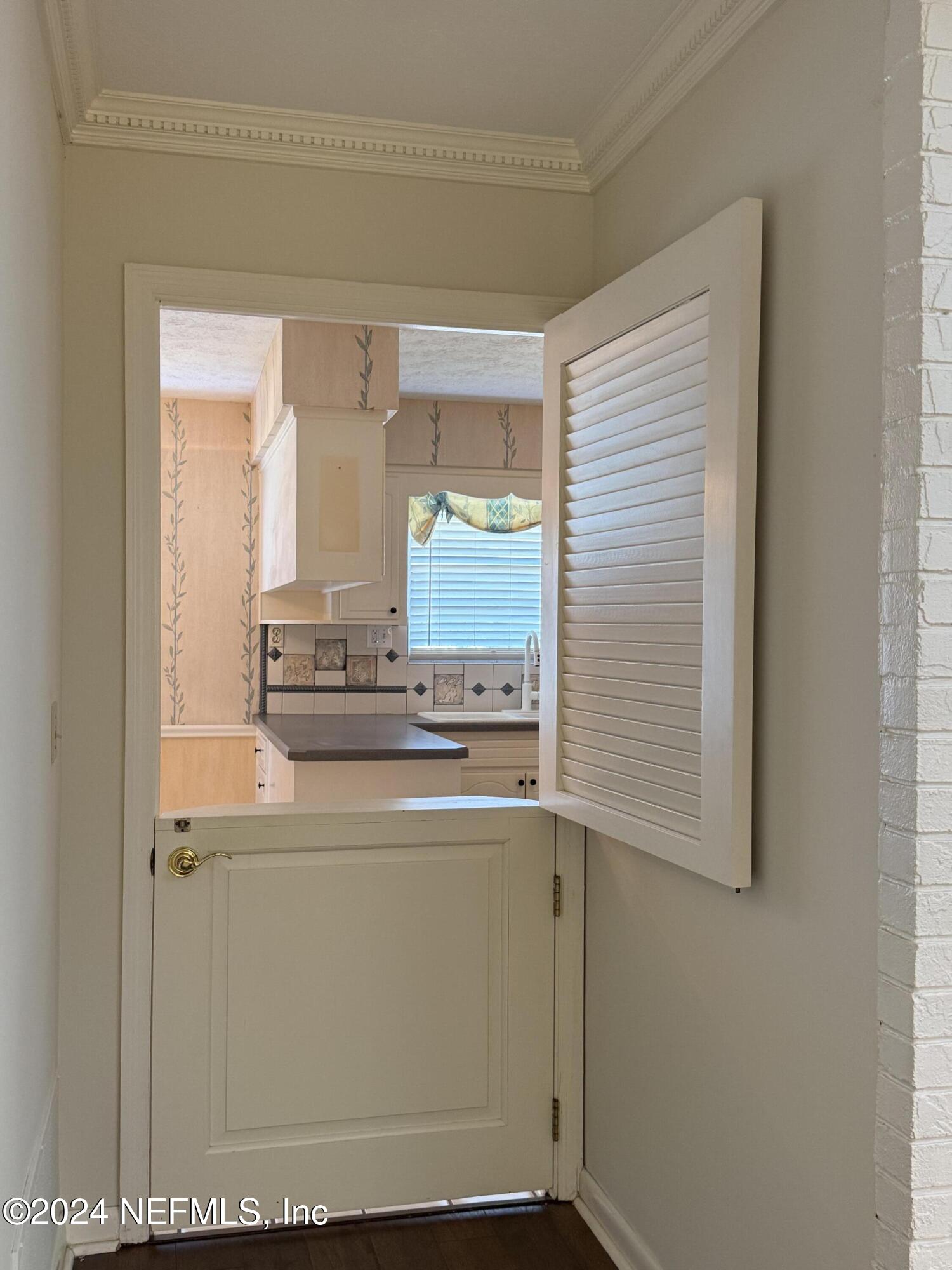 3401 Debussy Road Jacksonville, FL 32277 - Photo 29 of 96 Dutch door to kitchen