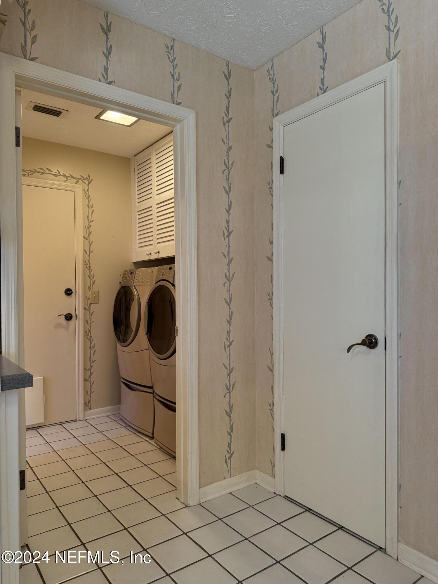 3401 Debussy Road Jacksonville, FL 32277 - Photo 40 of 96 Kitchen to laundry