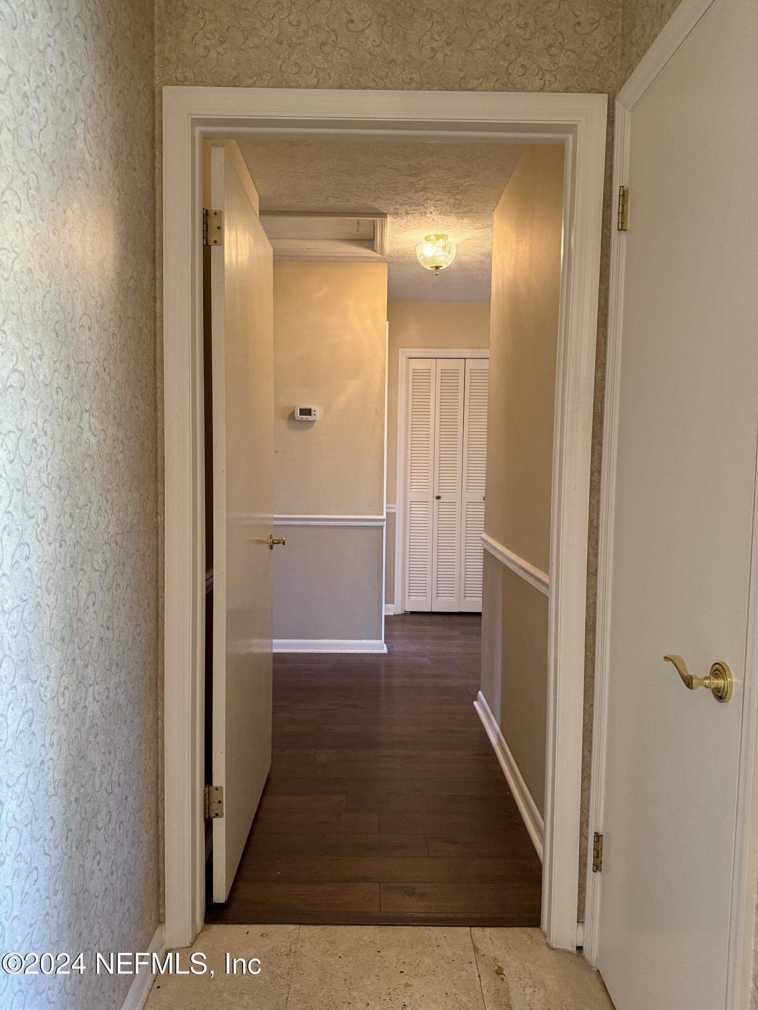 3401 Debussy Road Jacksonville, FL 32277 - Photo 49 of 96 Foyer to bedroom side