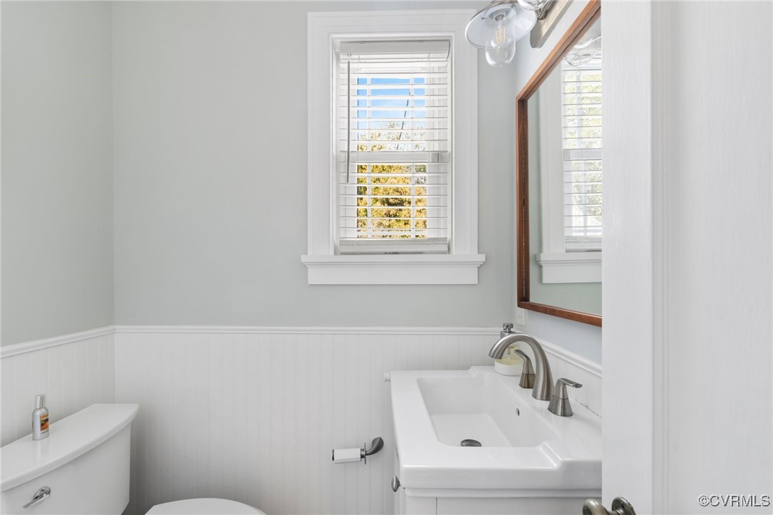 4100 Patterson Avenue Richmond, VA 23221 - Photo 18 of 37 a bathroom with a sink a toilet and a window