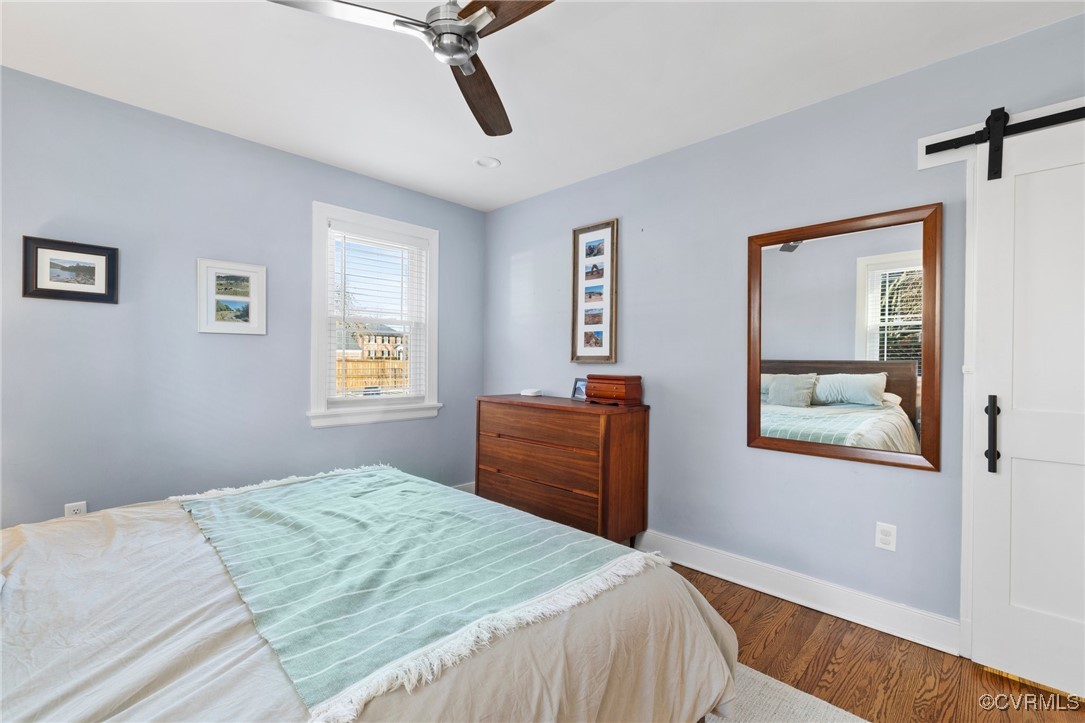 4100 Patterson Avenue Richmond, VA 23221 - Photo 21 of 37 a bedroom with a bed and a dresser