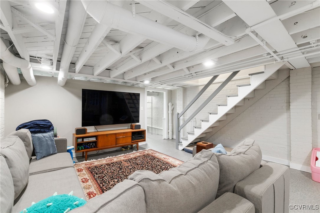 4100 Patterson Avenue Richmond, VA 23221 - Photo 28 of 37 a living room with furniture and a flat screen tv