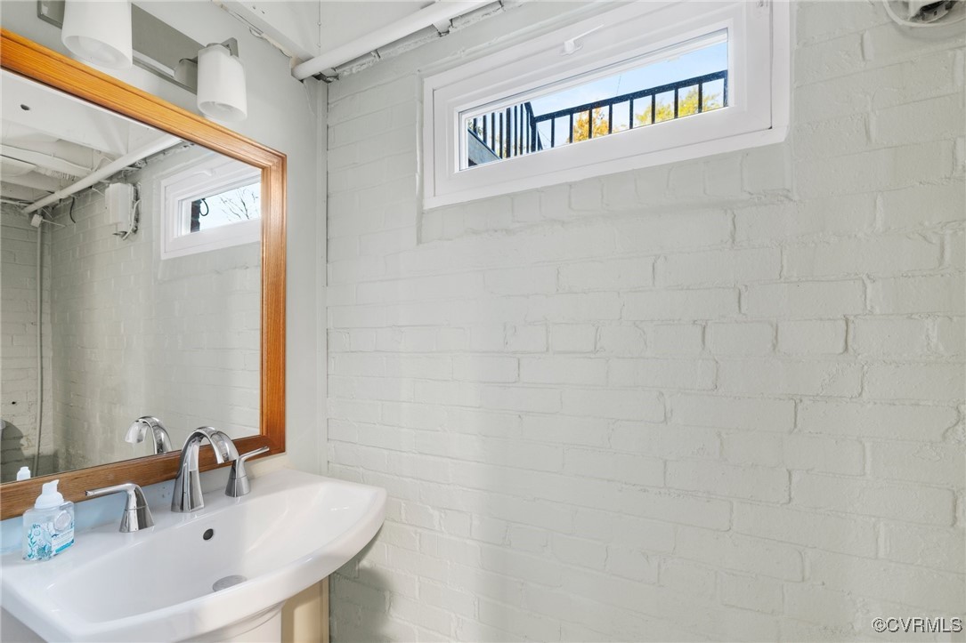 4100 Patterson Avenue Richmond, VA 23221 - Photo 29 of 37 a bathroom with a sink and a mirror
